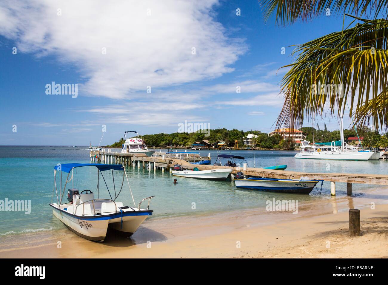 The beach pier restaurants and boats at West End in Roatan Honduras