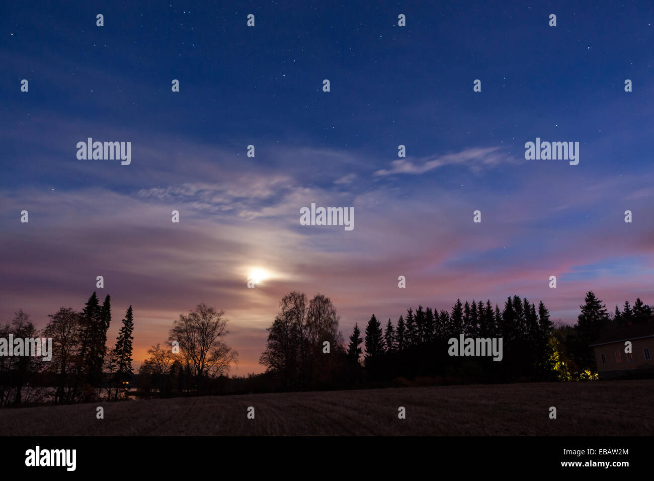 Night landscape and cloudy starry sky Stock Photo - Alamy