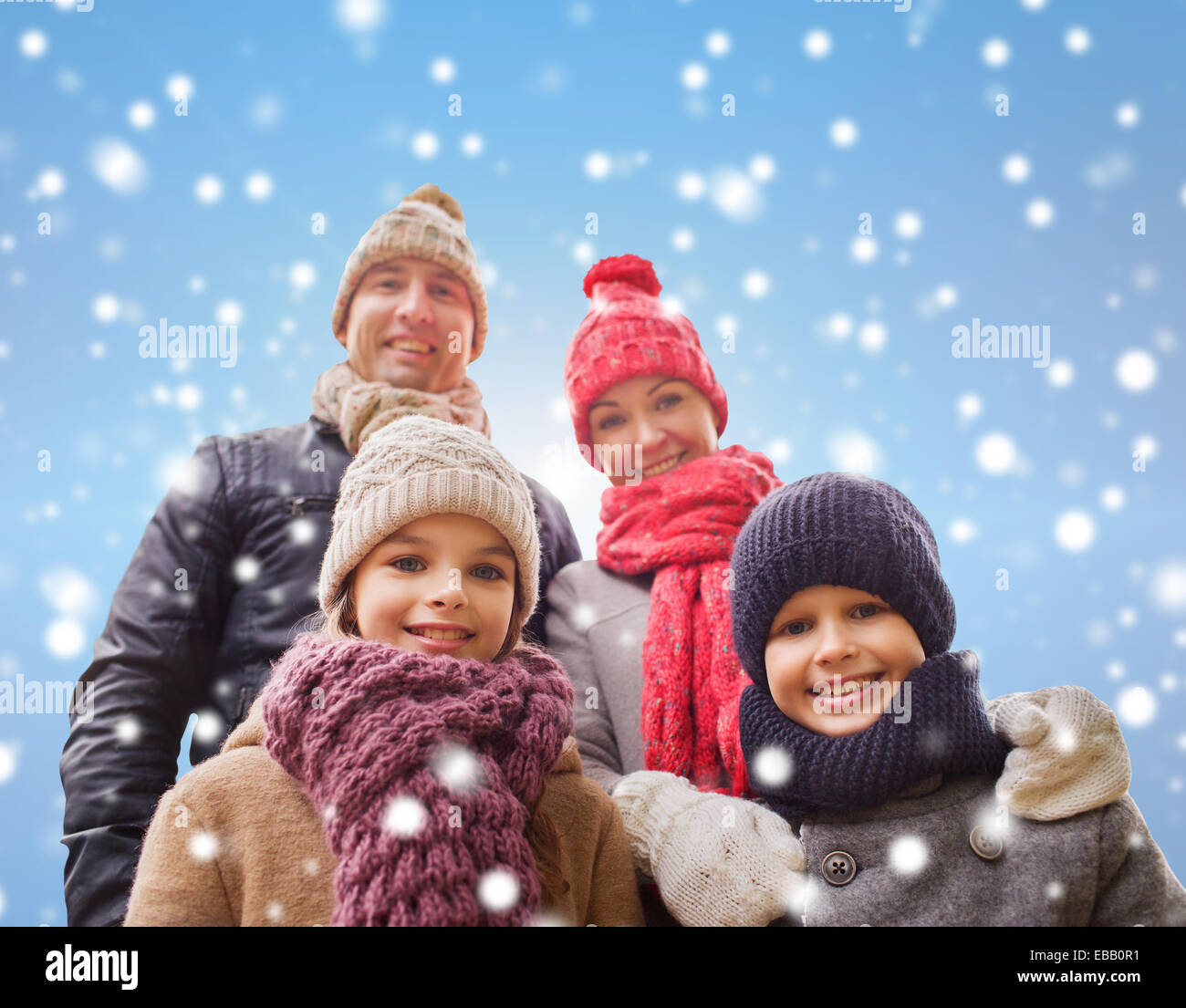 happy family in winter clothes outdoors Stock Photo - Alamy