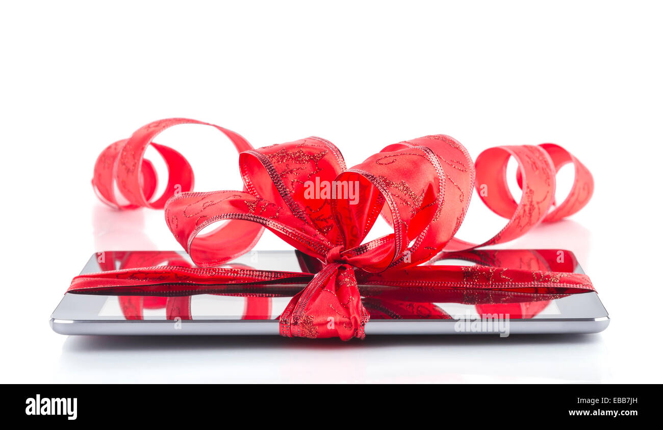 Digital tablet computer with Christmas ribbon Stock Photo