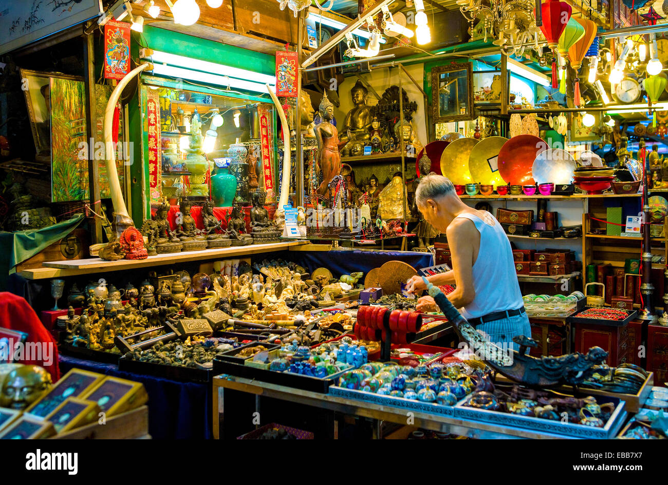 Hong Kong, an old seller in the flea market near Hollywood road. Stock Photo