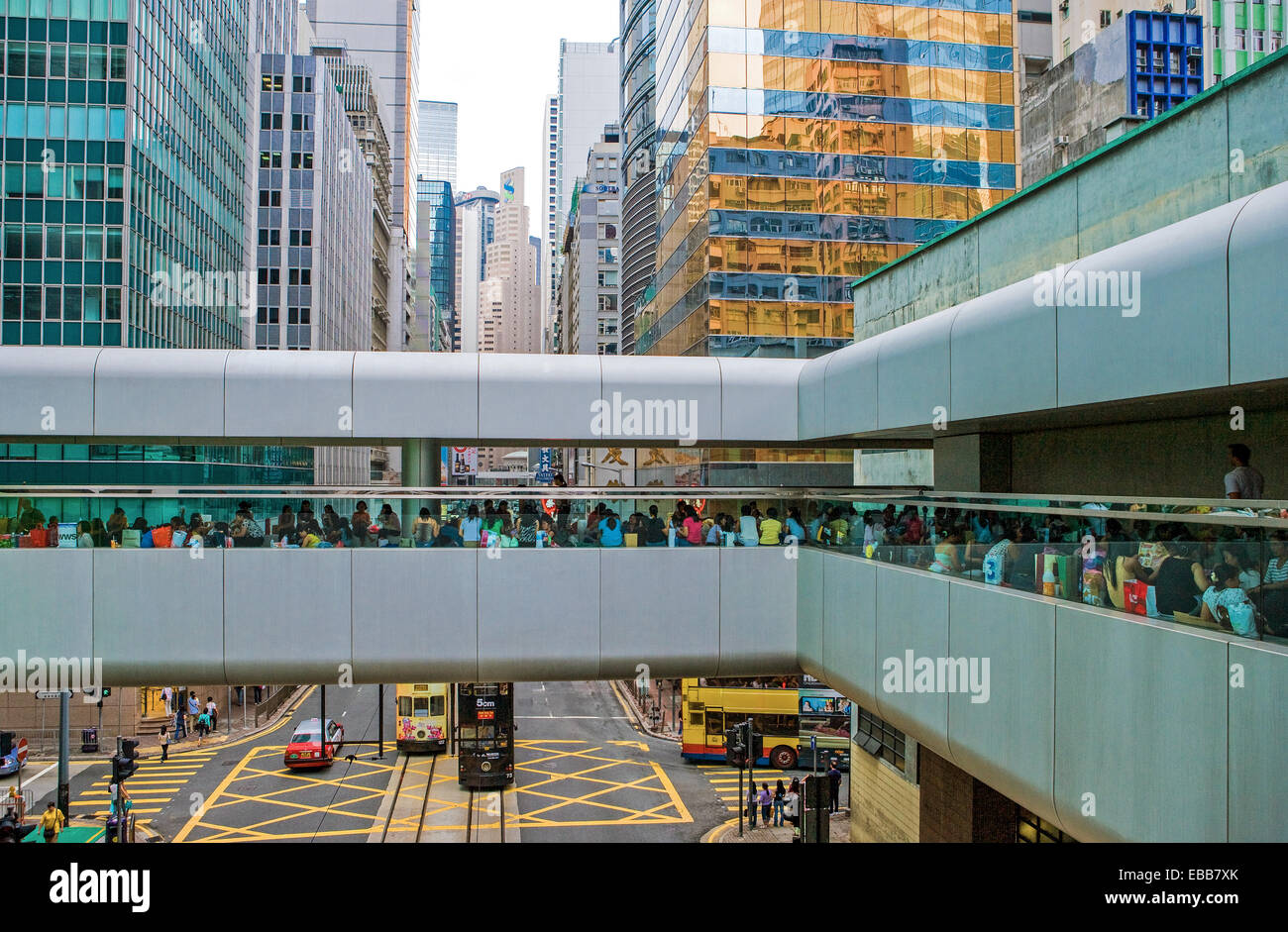 Hong Kong, raised walkway in the new city center, weekly meeting point for maids Stock Photo