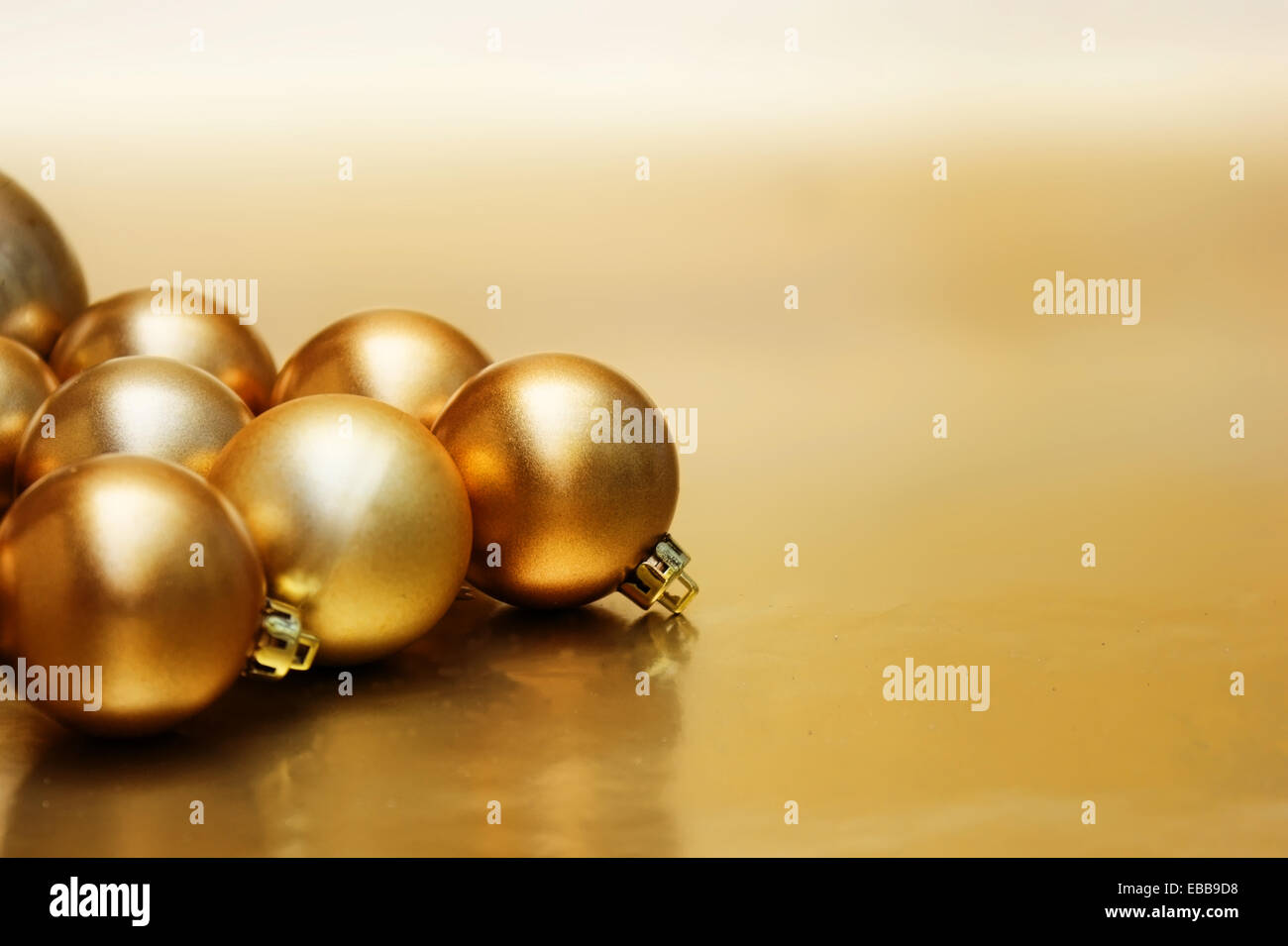 Christmas background with gold baubles Stock Photo