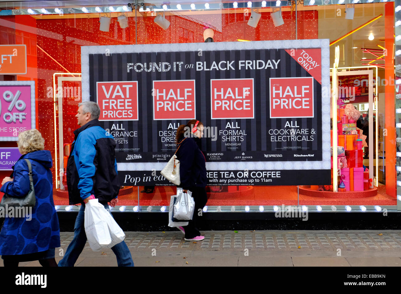 Shoppers walk in Oxford Street, on black Friday Stock Photo