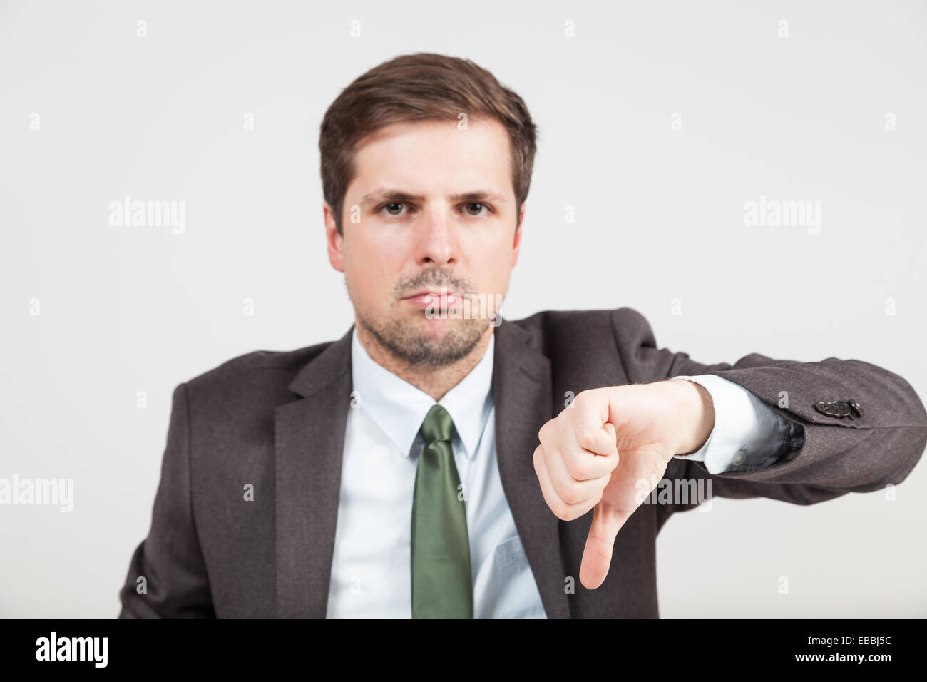 hands with thump down of a businessman Stock Photo