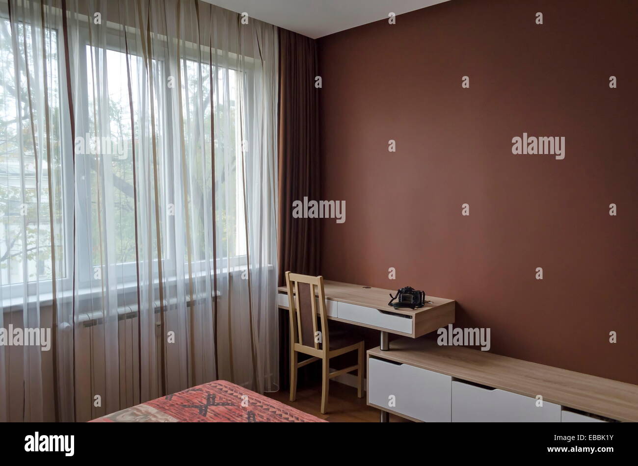 Work nook by bedroom in renovated apartment in Sofia, Bulgaria Stock Photo