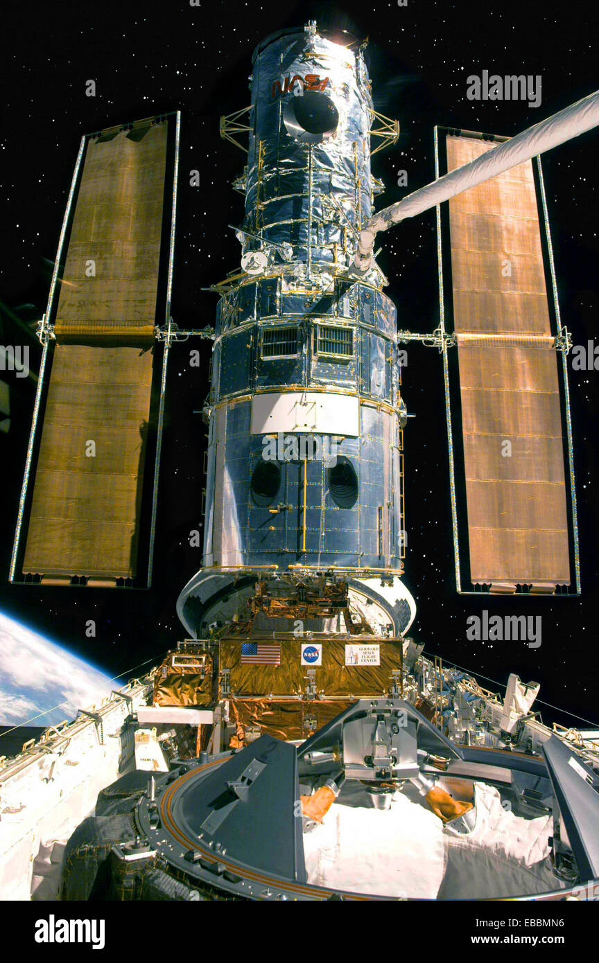 The Hubble Space Telescope rests in the Space Shuttle Discovery’s cargo