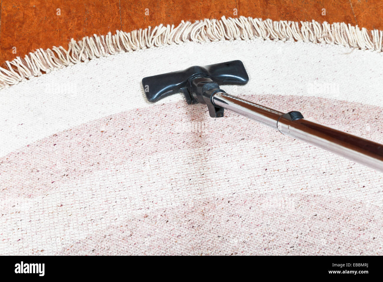 carpet cleaning with a hoover at home Stock Photo Alamy