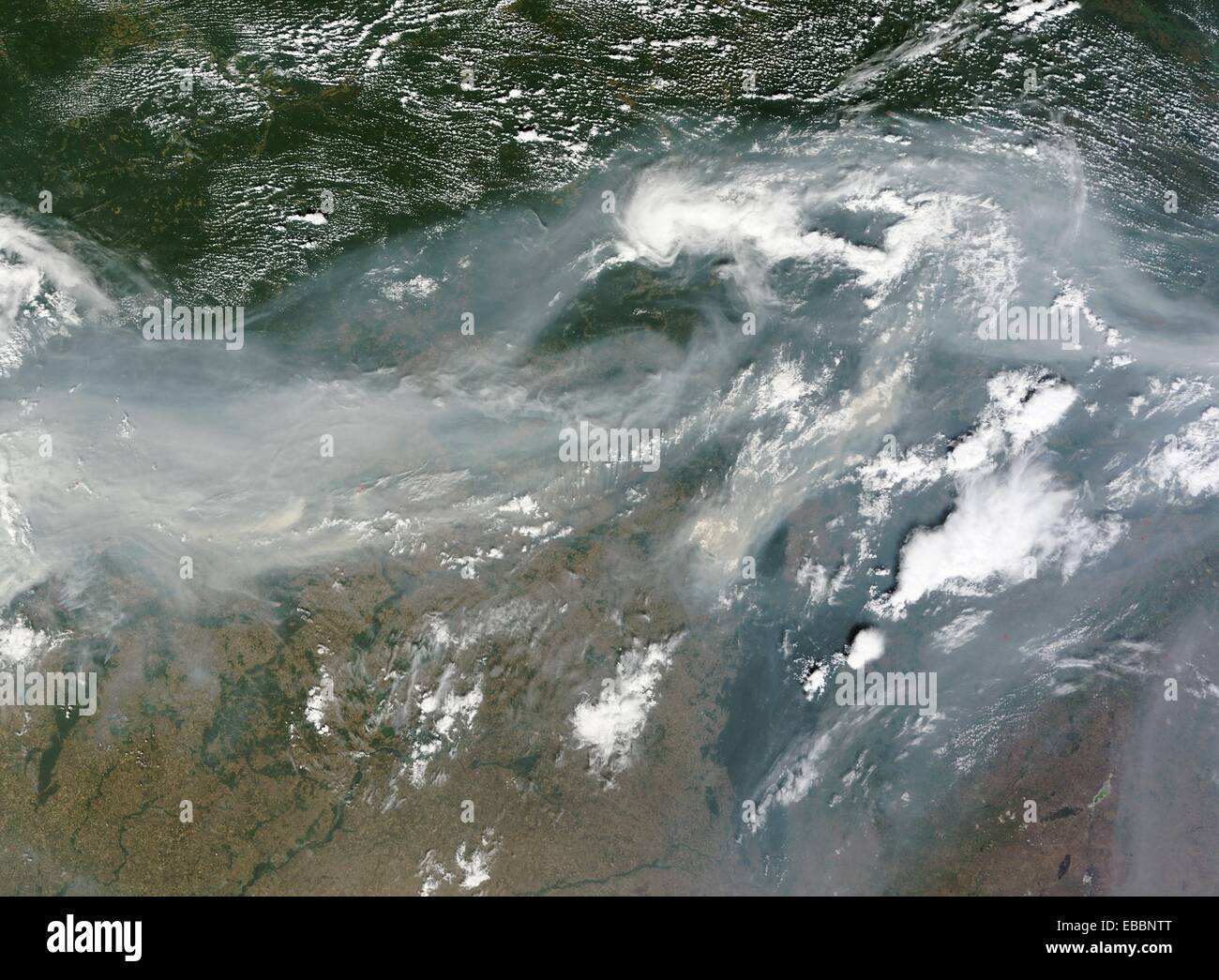 Hundreds of fires burned across western Russia on August 2, 2010, but it is the smoke that conveys the magnitude of the Stock Photo