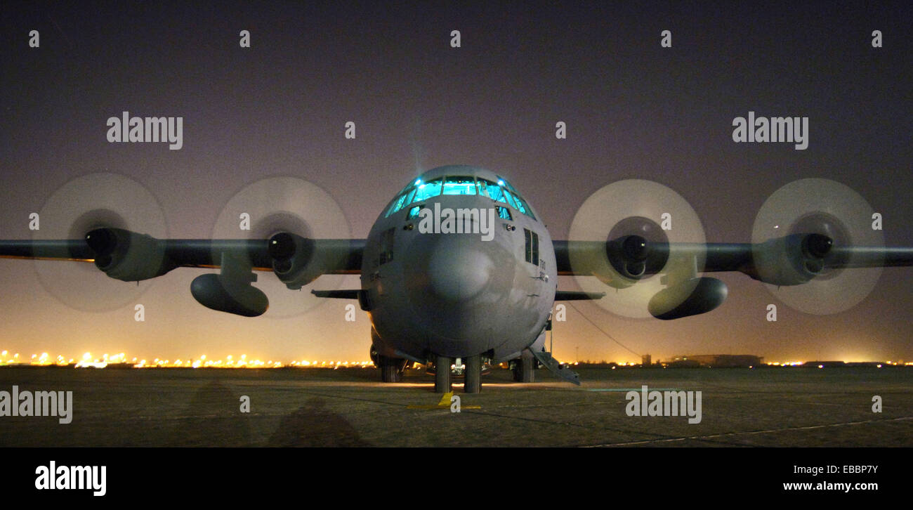 An Air Force Reserve C-130 Hercules is readied for takeoff at Sather Air Base, Iraq, on Wednesday, April 19, 2006. The aircraft Stock Photo