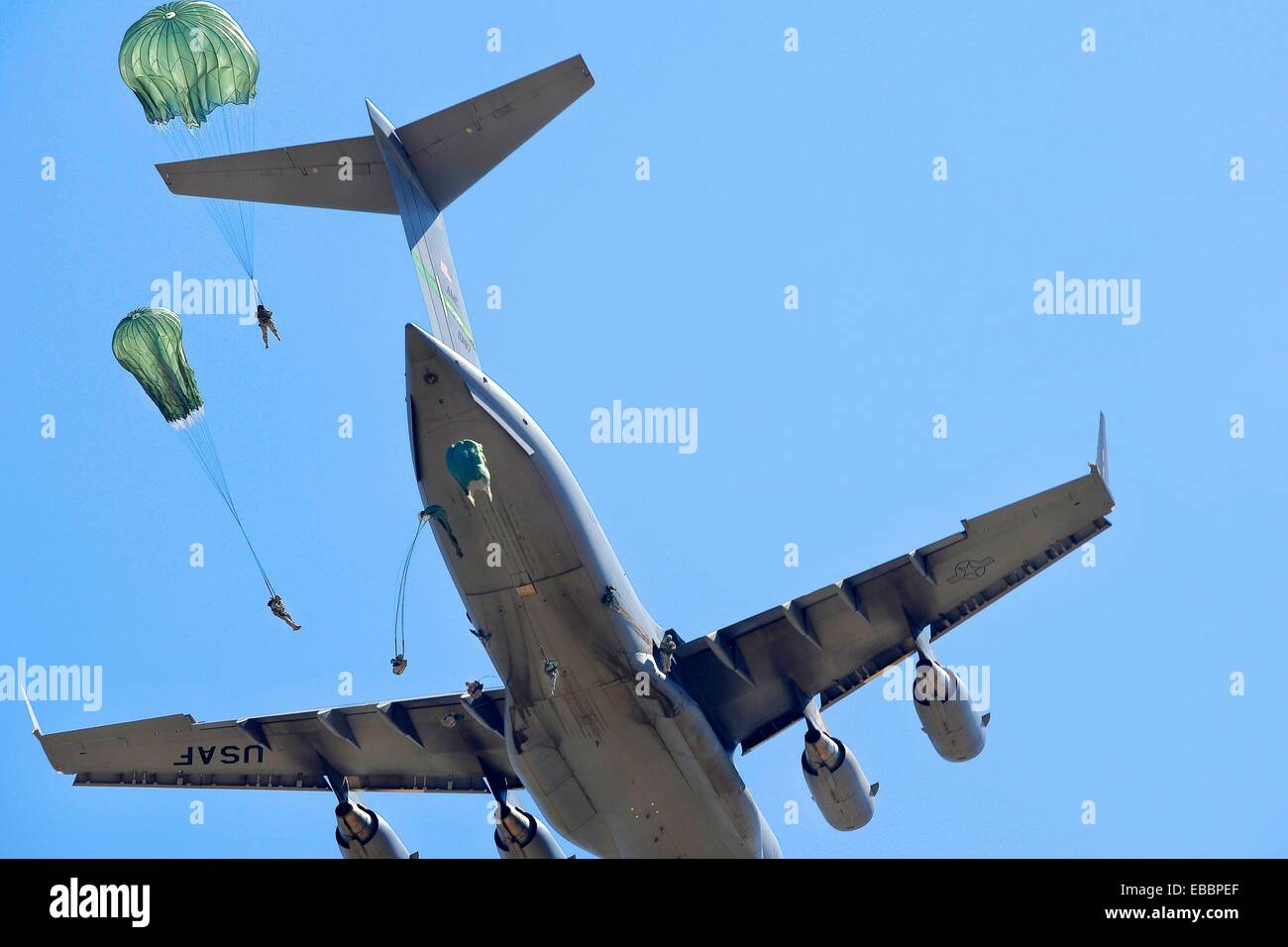 U S Army paratroopers with the 82nd Airborne Division jump from a C17