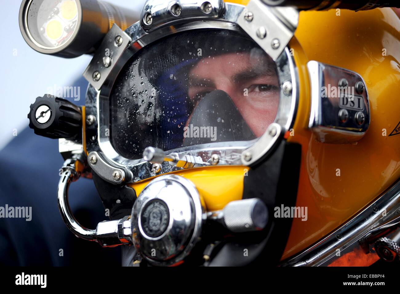 NORTH SEA July 27, 2011 Navy Diver 2nd Class Martin Horan, assigned to Mobile Diving and Salvage Unit MDSU 2, prepares for a Stock Photo