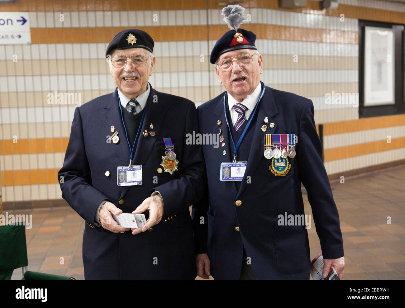 Two Gentlemen on Behalf of  Taxi Benevolent Fund Collecting for the War Disabled at Charing Cross Station in London UK Stock Photo