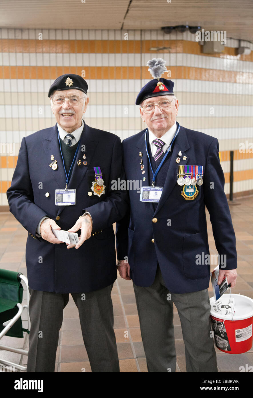 Two Gentlemen on Behalf of  Taxi Benevolent Fund Collecting for the War Disabled at Charing Cross Station in London UK Stock Photo