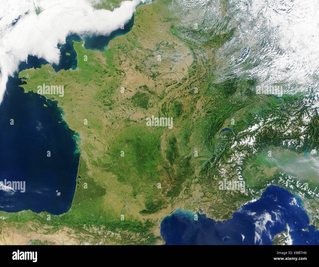 An unusually cloud-free France shows green and tan in this true-color Moderate Resolution Imaging Spectroradiometer (MODIS) Stock Photo