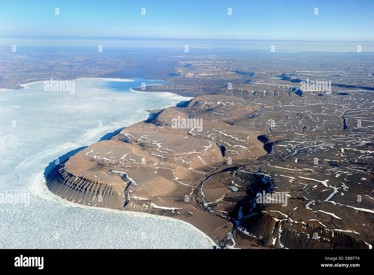 Aerial view of icepack and cliffs in Devon Island Nunavut Canada Stock