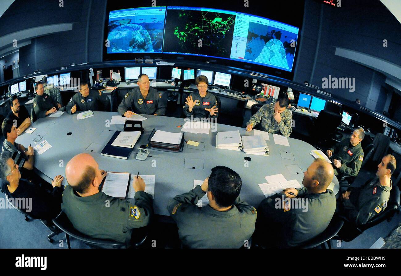 Col  Lynn Coehoorn, center, conducts a changeover briefing with 618th Tanker Airlift Control Center members Jan  23 at Scott Stock Photo
