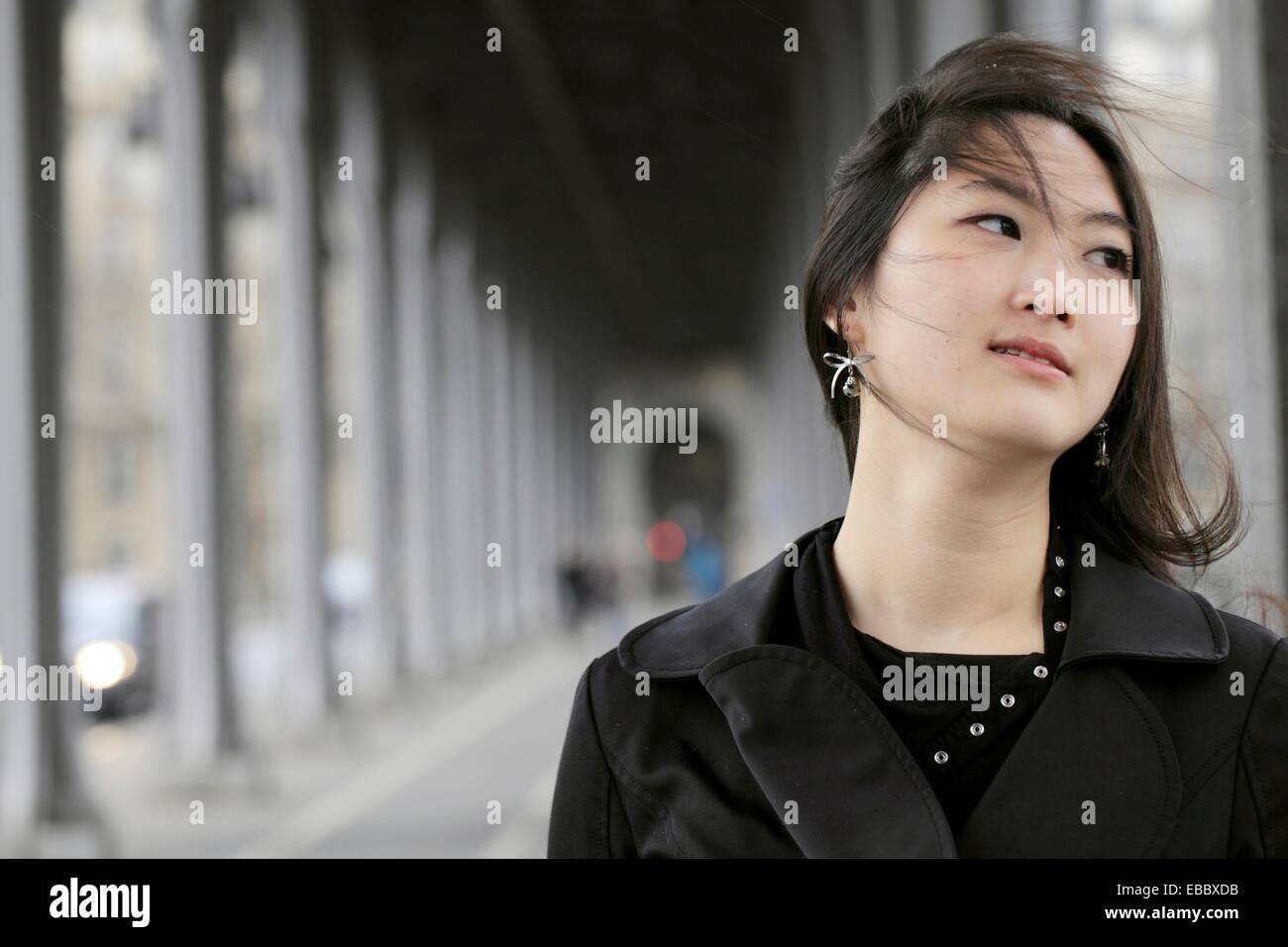 An asian girl in the pedestrians level of Pont Bir-Hakeim, Paris, France Stock Photo