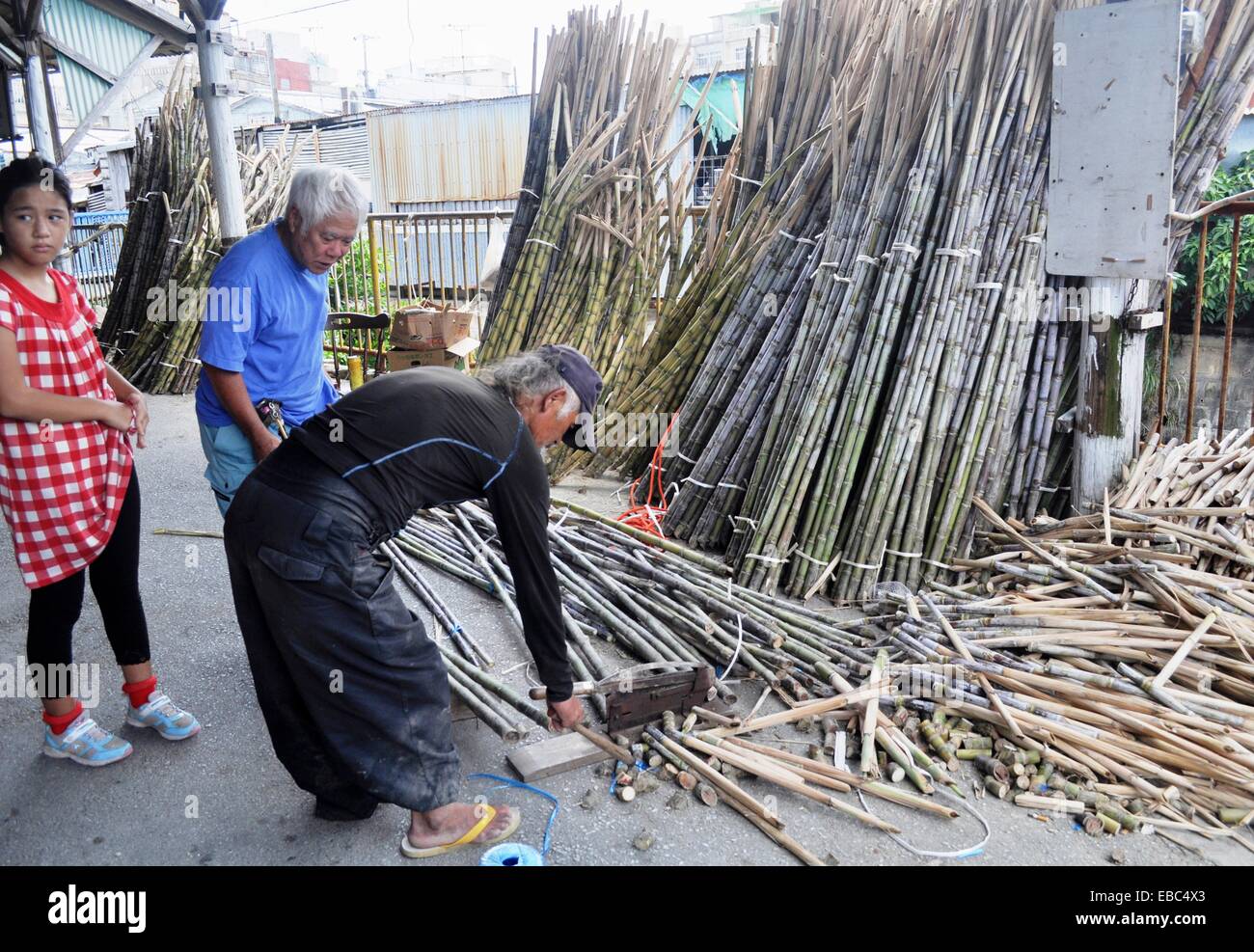 Naha Okinawa Japan sugarcane sold during Obon Makishi Stock Photo