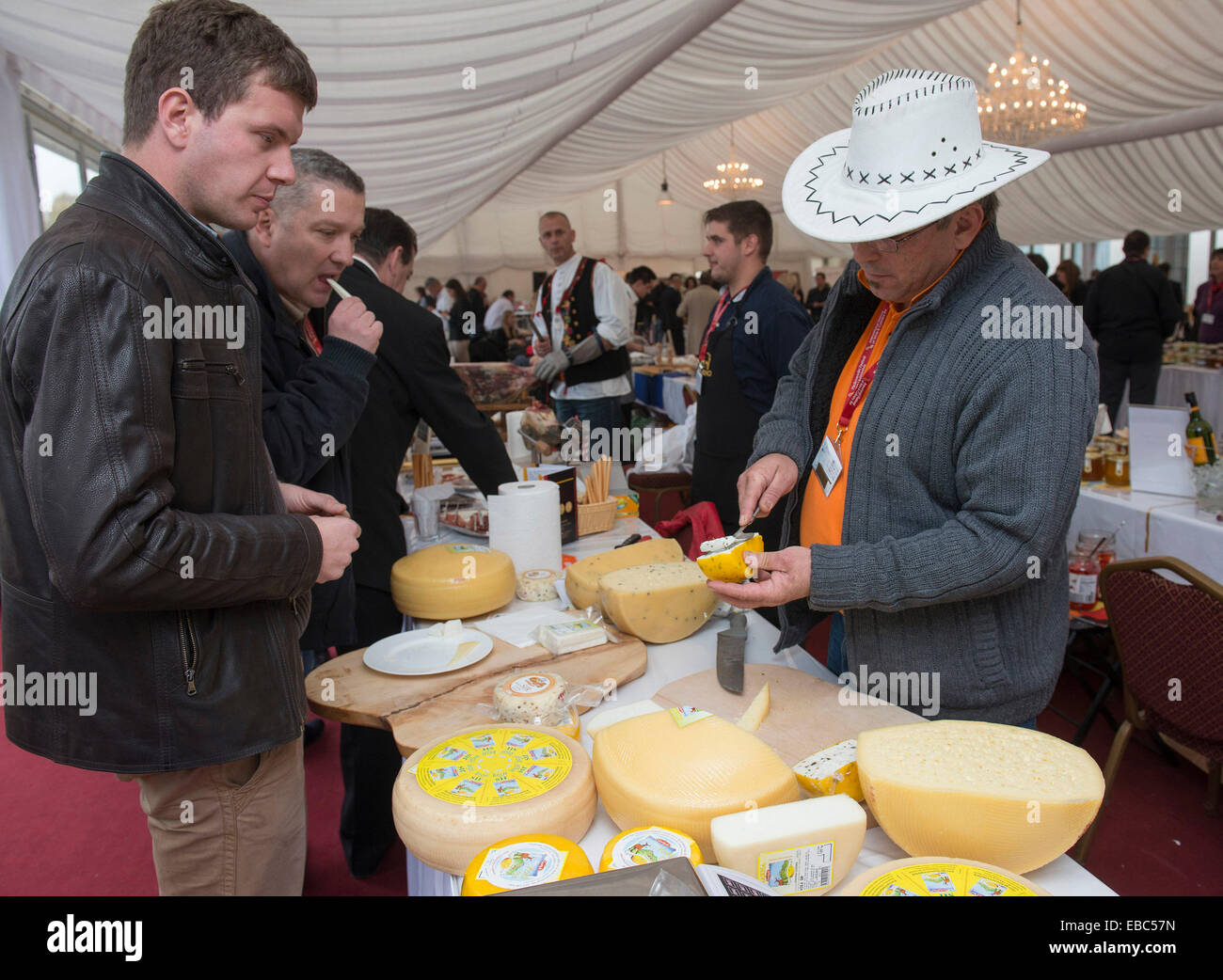Zagreb, Croatia. 28th Nov, 2014. Visitors taste cheese during the 9th Zagreb VINOcom-International Festival of Wine and Culinary Art at the Esplanade hotel in Zagreb, capital of Croatia, Nov. 28, 2014. The two-day wine and food festival kicked off here on Friday with participation of more than 300 wine and food exhibitors from Croatia and nearby region. © Miso Lisanin/Xinhua/Alamy Live News Stock Photo