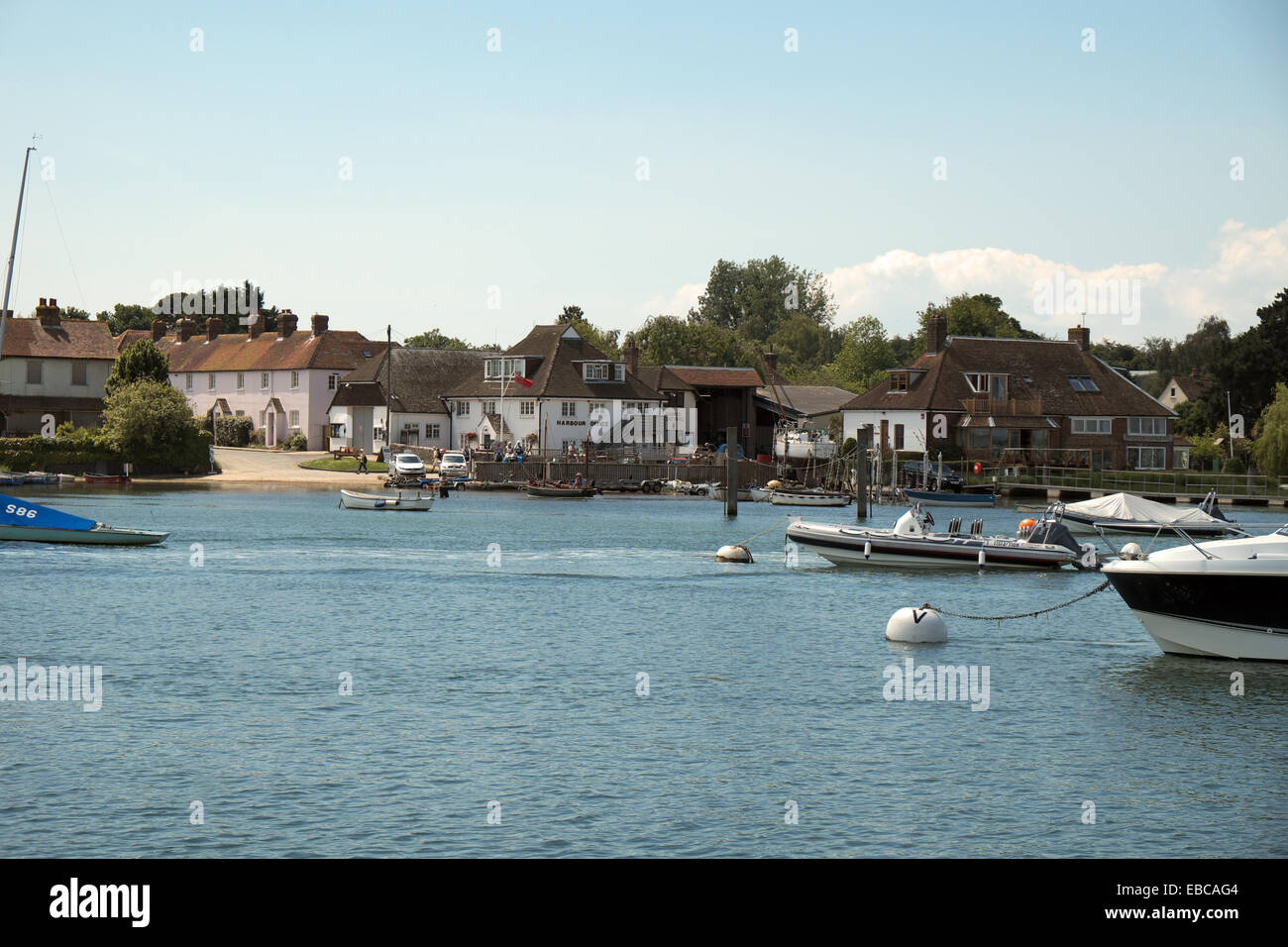 Itchenor Harbour Office and sailing boats, West Sussex, England - on Chichester Harbour Stock Photo