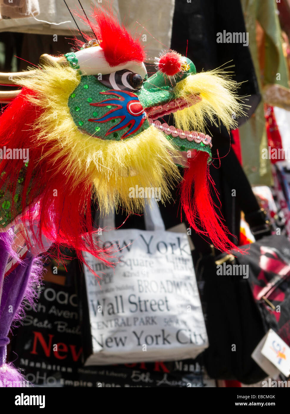 Dragon and Bags Hanging in Chinatown, NYC Stock Photo