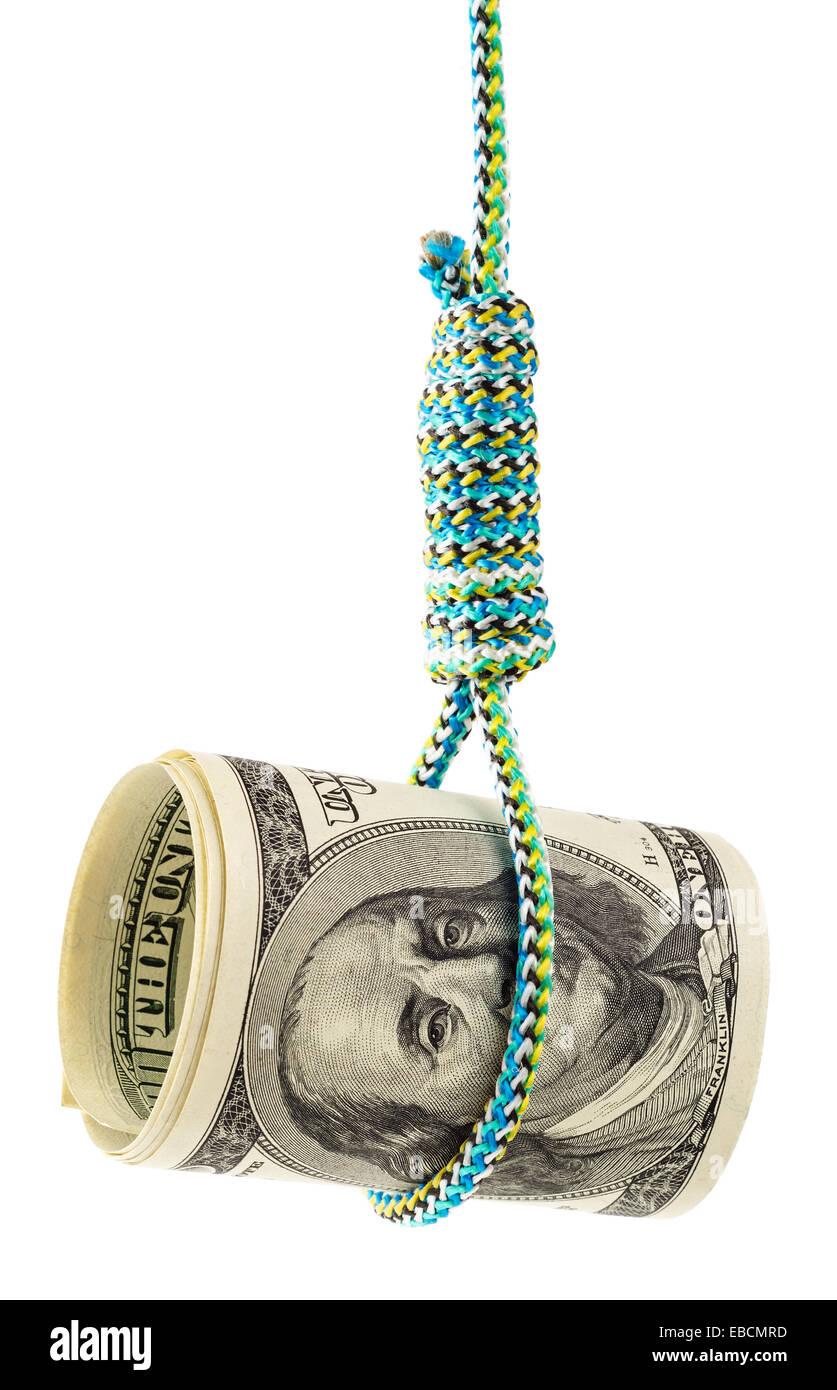 Money debt and credit. Rolled dollars in a noose depicting tough economic times, devaluation, recession and financial collapse. Stock Photo