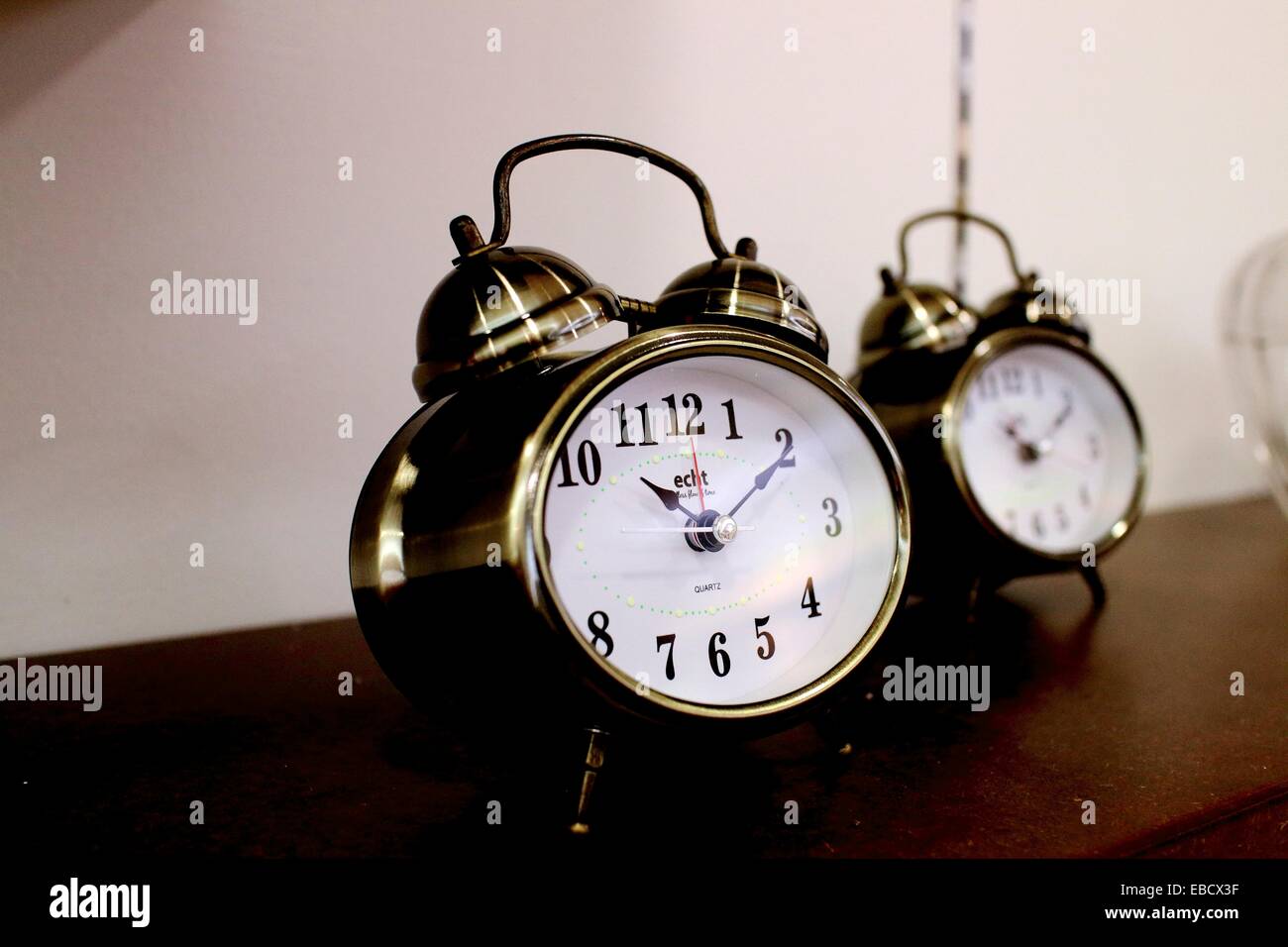 Alarm clock on table Stock Photo Alamy