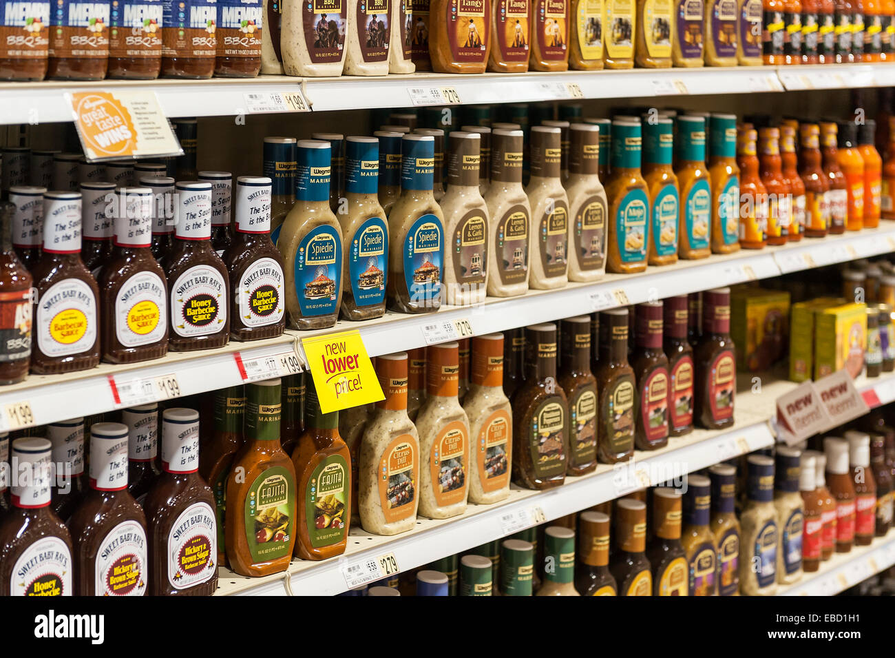 Selection of marinades and barbecue sauce in a grocery store, USA Stock