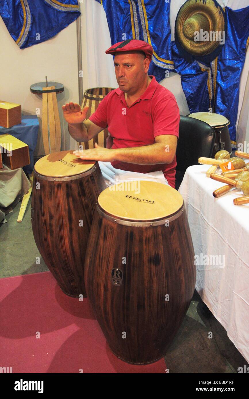 Musician playing bongo drums Stock Photo Alamy