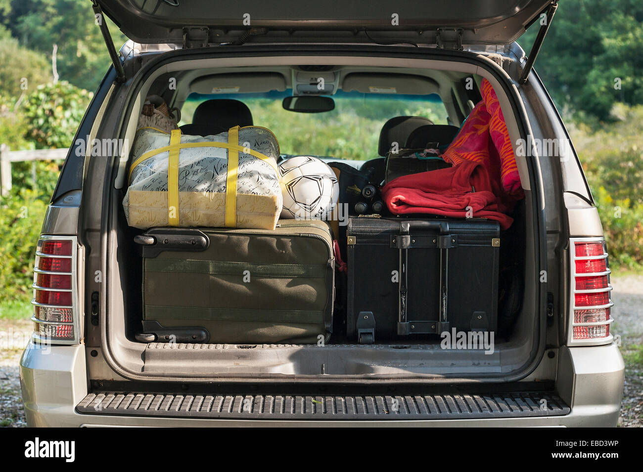 SUV car packed for vacation trip. Stock Photo