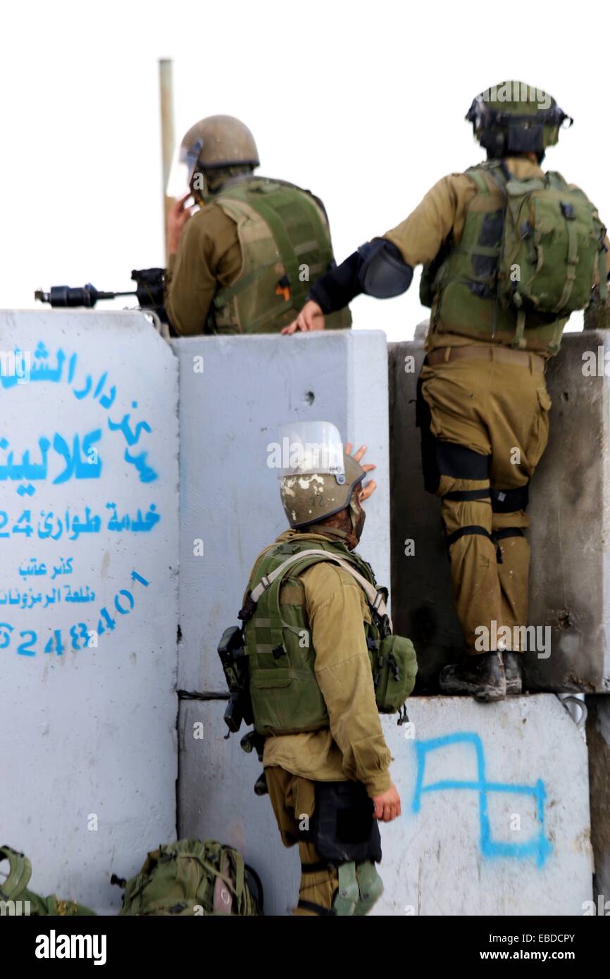 Israeli Soldiers Stand On Cement Barriers, Getting Ready To Aim Tear ...