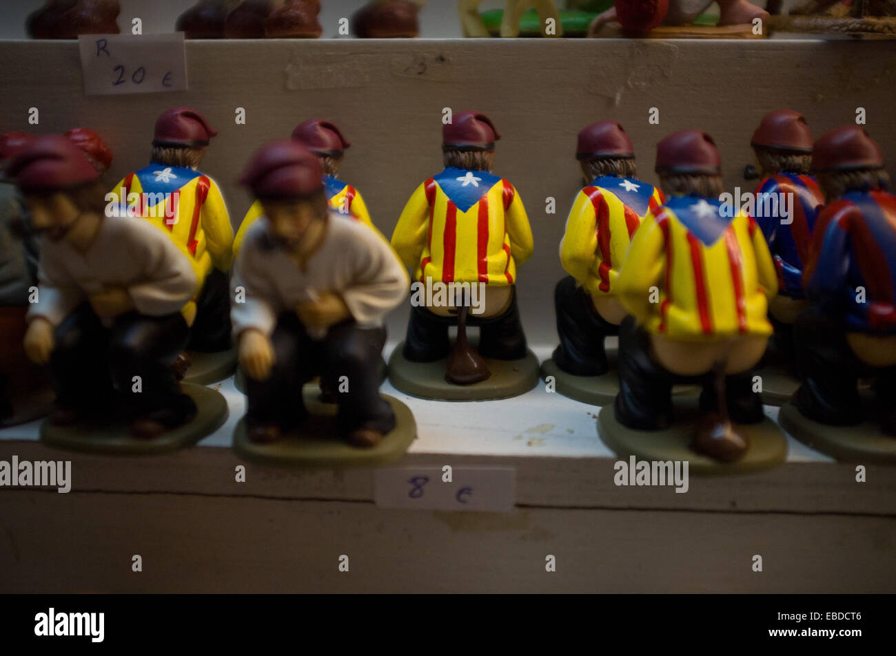 Barcelona, Catalonia, Spain. 28th November, 2014. Caganers, a character in  Catalan mythology relating to a Christmas tradition, wearing catalan  independentists flags (estelada) for sale in Barcelona's Christmas  market.The Christmas Market in Barcelona (, image size:1300x953