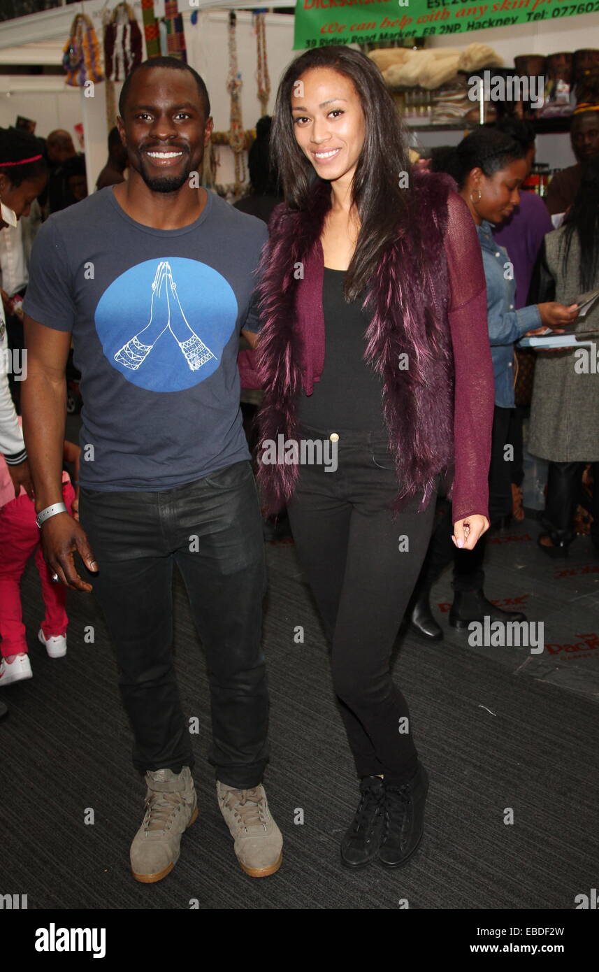 Former Miss England Rachel Christie and 'Wire' actor Gbenga Akinnagbe attend Afro Hair and Beauty Live.  Featuring: Rachel Christie,Gbenga Akinnagbe Where: London, United Kingdom When: 26 May 2014 Stock Photo