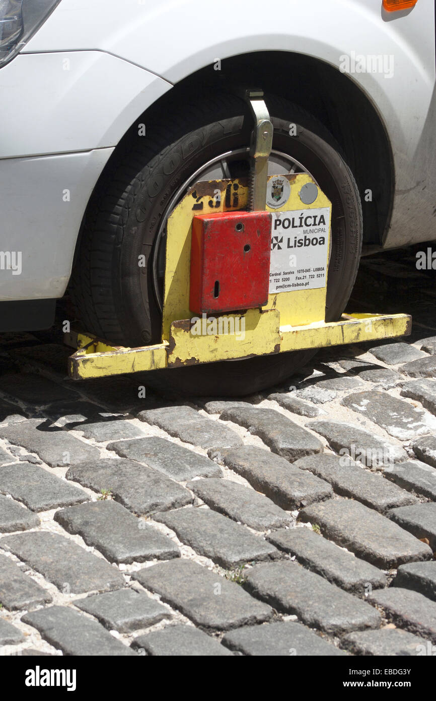 Car wheel boot, Lisbon, Portugal Stock Photo Alamy