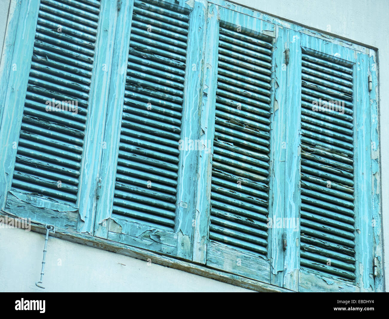 Worn battered louvre shutters. In need of a coat of paint. Cape Town South Africa Stock Photo