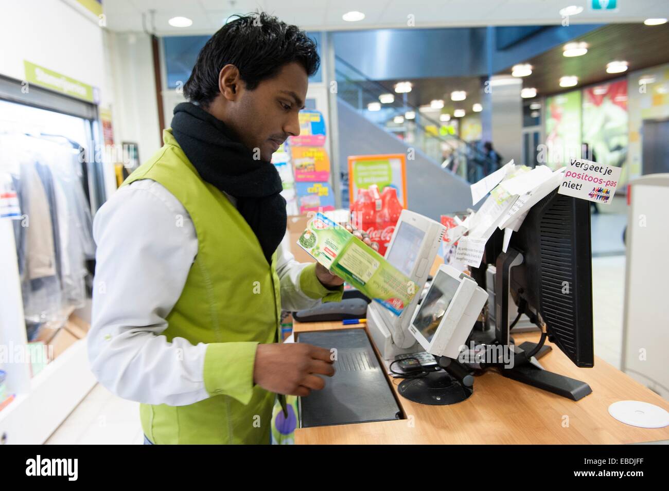 working a cash register