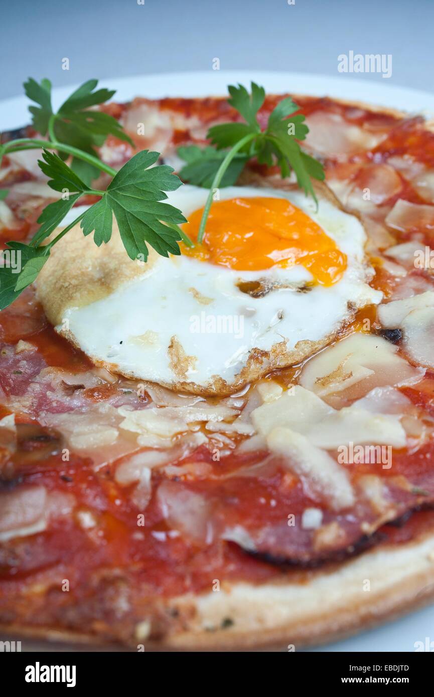 CHEESE PIZZA WITH EGG AND SAUSAGE SPAIN Stock Photo Alamy