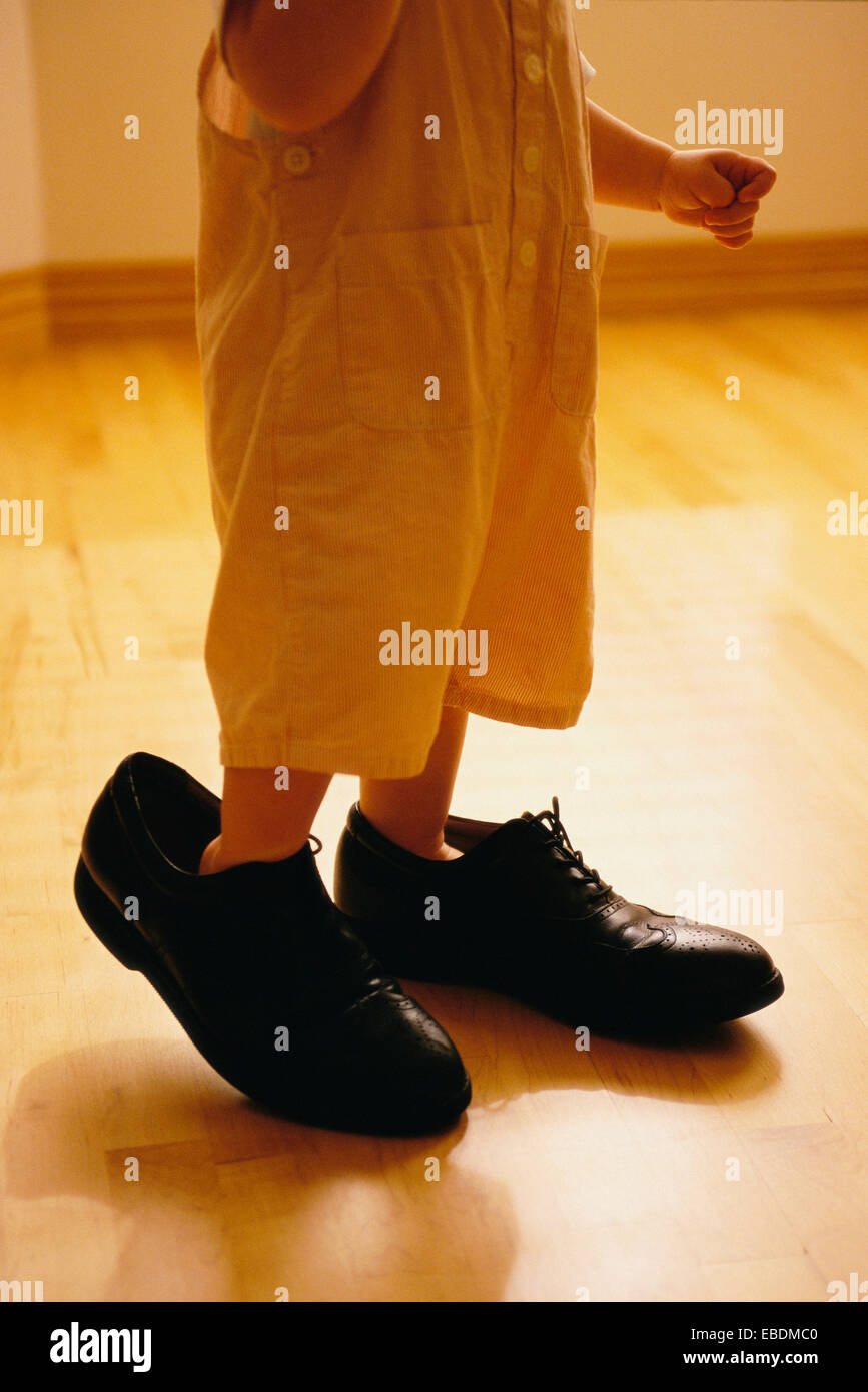 Boy wearing girl shoes hires stock photography and images Alamy