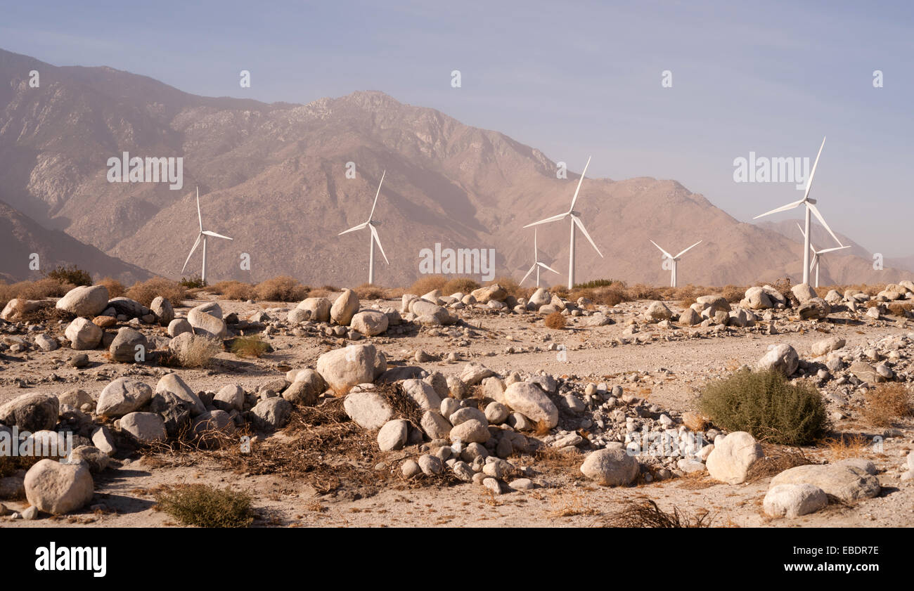 Wind turbines generate energy that goes across the mountains to LA Stock Photo
