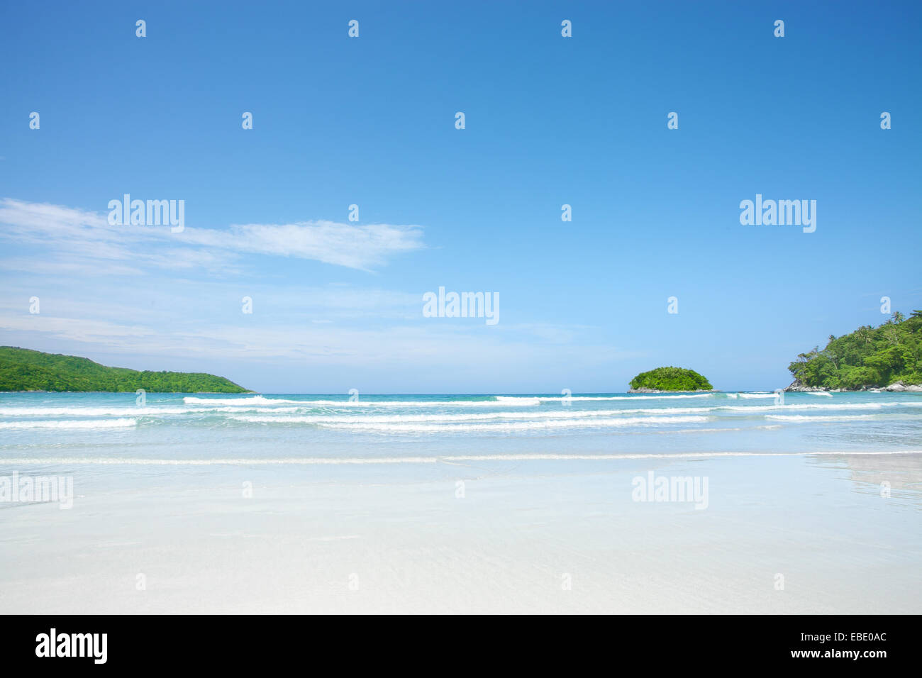 panoramic View of nice tropical beach with with island in the distance ...