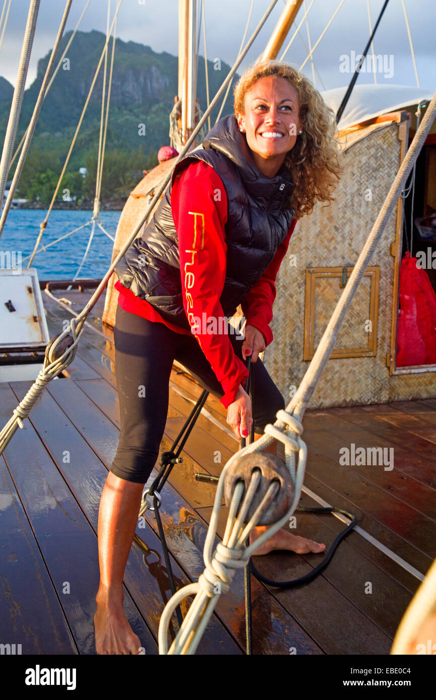 Crew member on the Marumaru Atua, a tradiotnal Cook Islands vaka (canoe ...