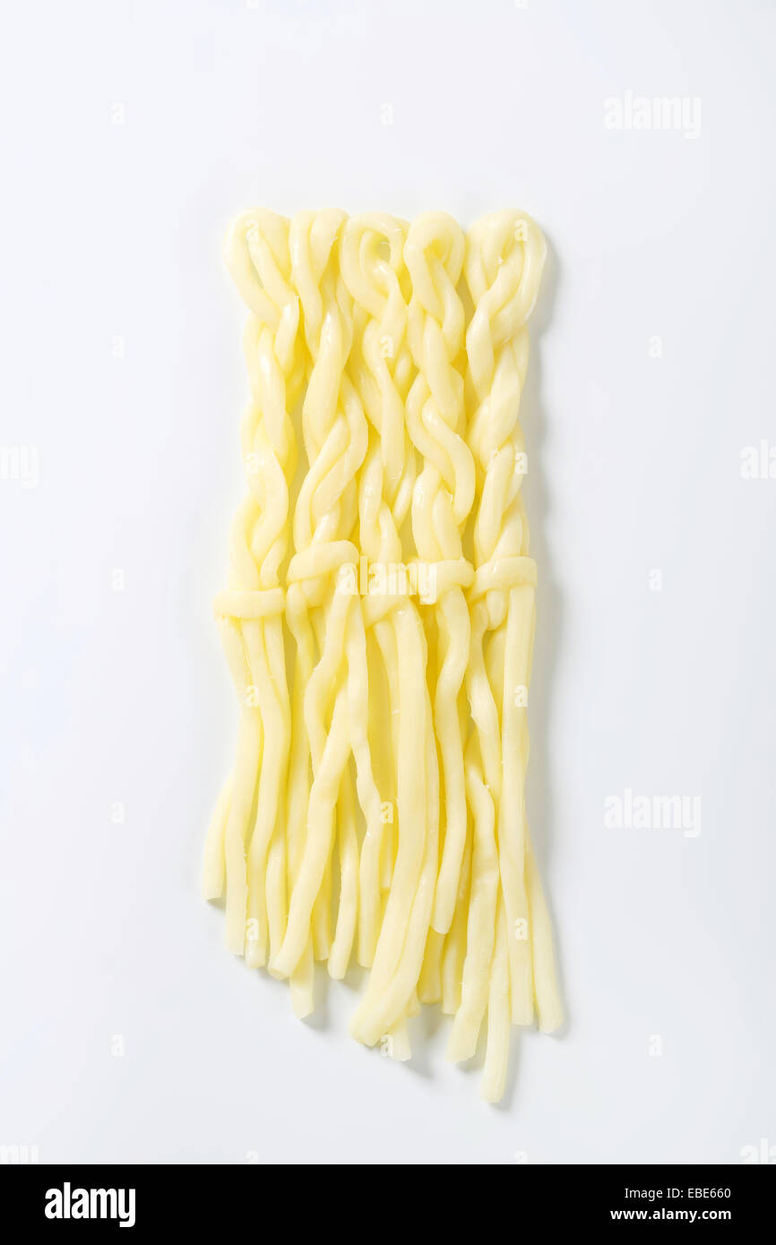Slovak cuisine - String cheese in the shape of little braids (Korbaciky) Stock Photo