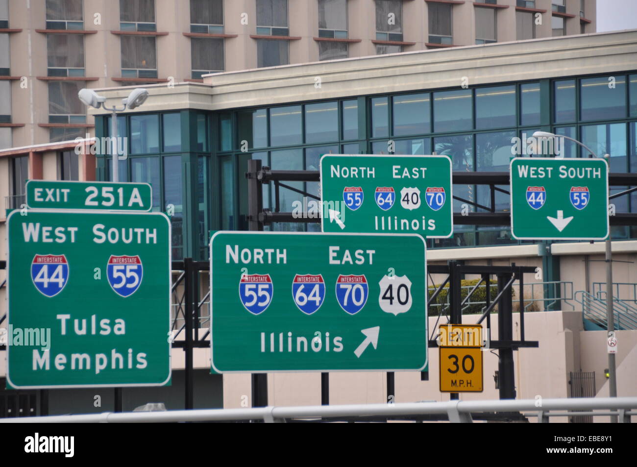 Road signs on Highway 40 as it crosses the Mississippi River into St Louis Missouri from Illinois. Stock Photo
