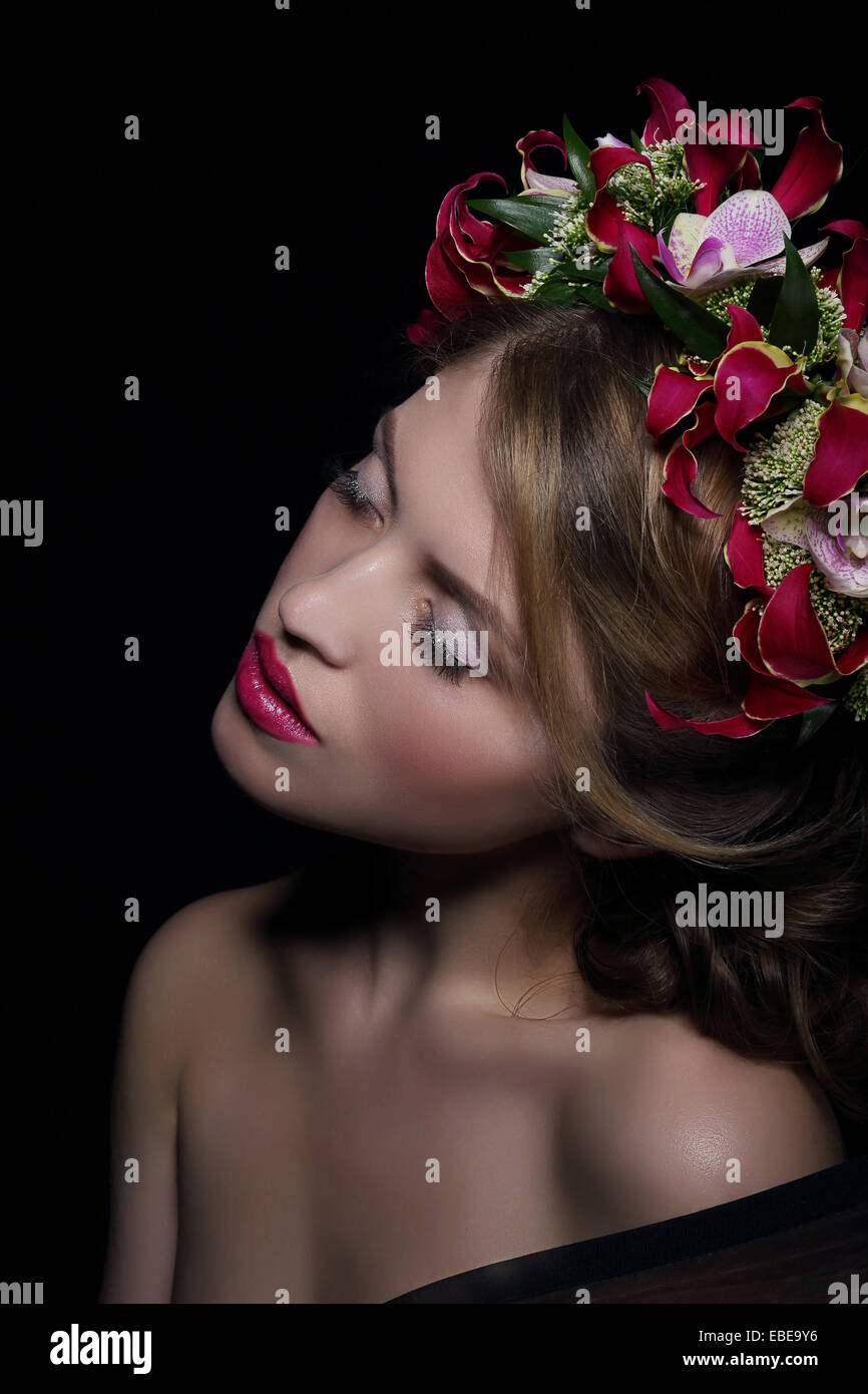 Elegance. Bliss. Dreamy Woman with Wreath of Flowers Stock Photo