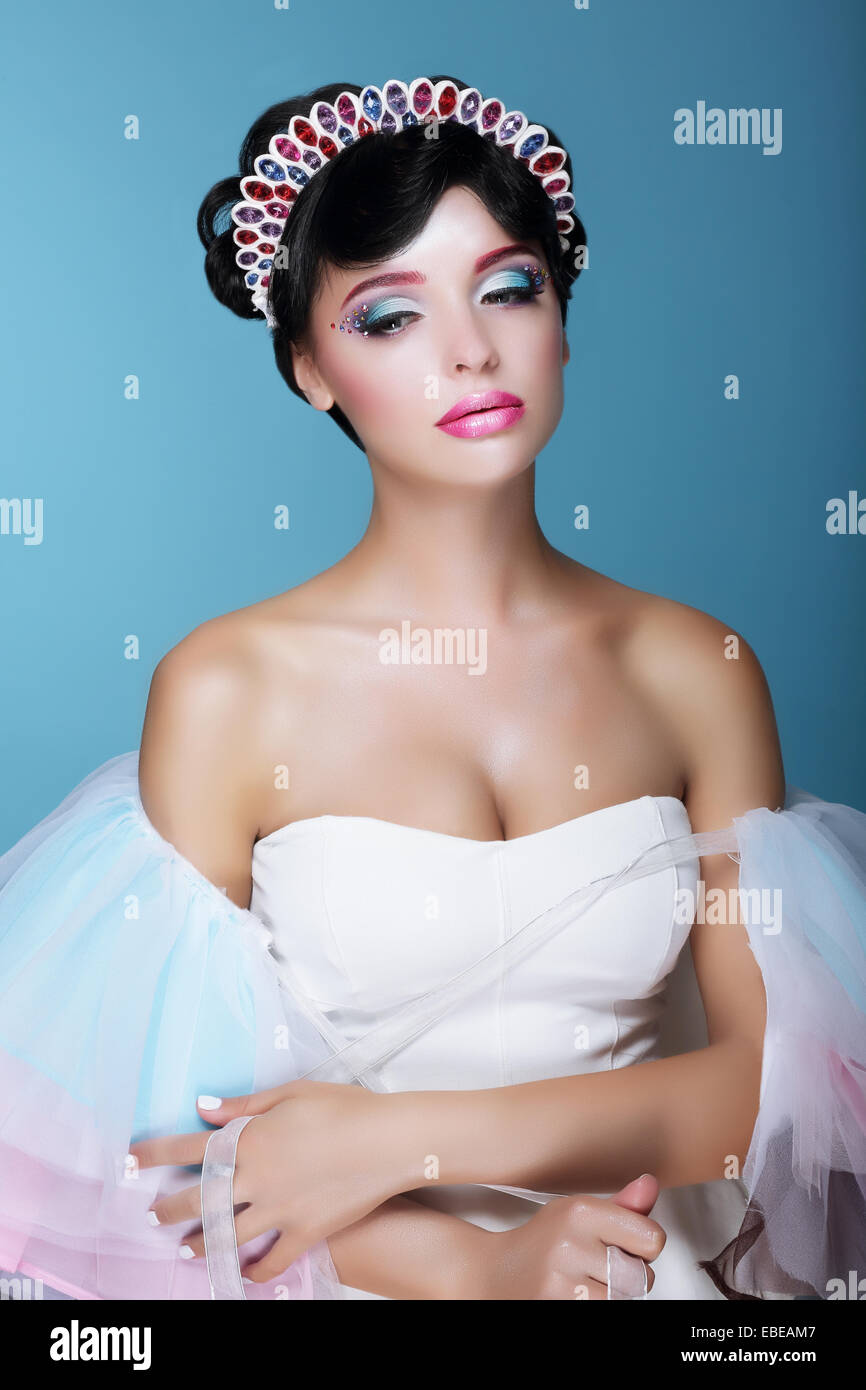 Inspiration. Fashion Model with Dramatic Theatrical Makeup and Diadem Stock Photo