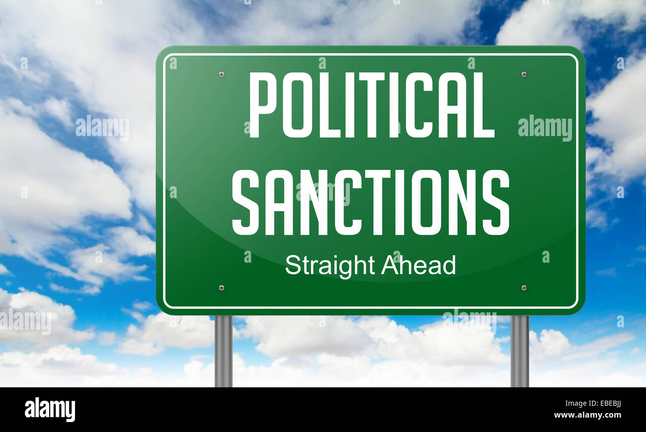 Highway Signpost with Political Sanctions Wording on Sky Background. Stock Photo