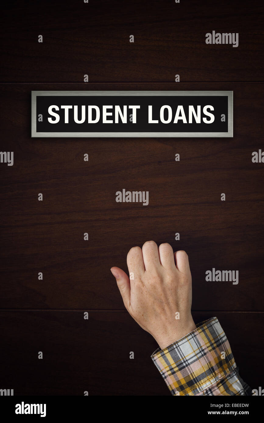 Female hand is knocking on Student Loans door, conceptual image. Stock Photo