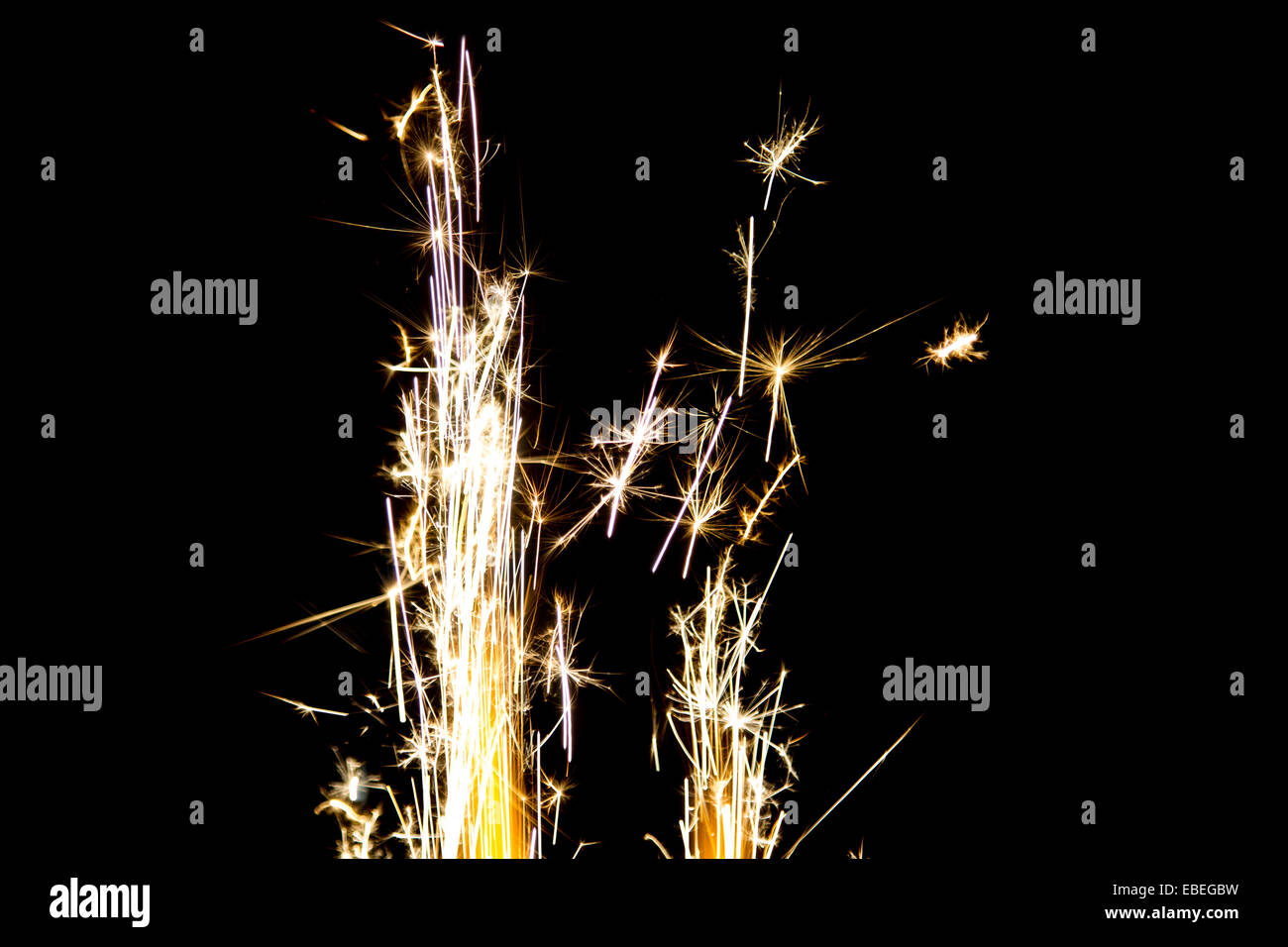 Closeup to sparks on a black background Stock Photo