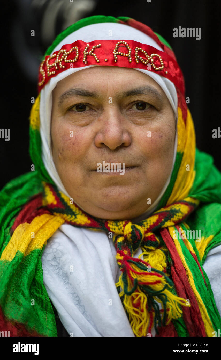 A Kurdish demonstrator with a handband (Serok APO, Serok for head, APO  for Abdullah Ocalan) demonstrates against the ban of the Kurdistan Workers  Party (PKK) at the main station in FrankfurtMain, Germany,